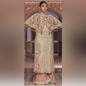 Saira Shakira heavy designer suit